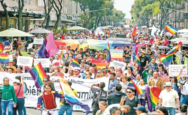 Crowds fill the street for the Gay Pride Parade in Mexico City, one of the world's largest, every June. Photo courtesy of El Universal. 